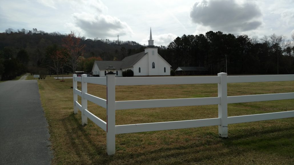 Ooltewah Church of Christ Building front with fence